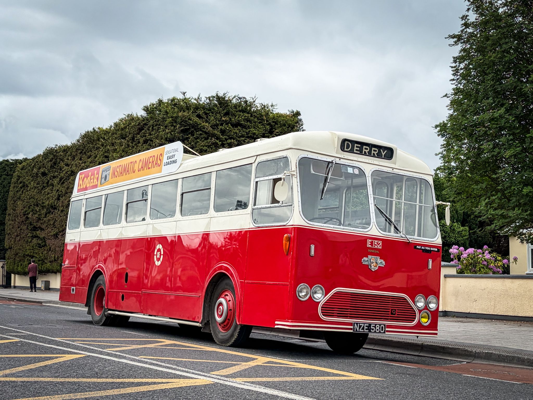 E152 red and white provincial bus