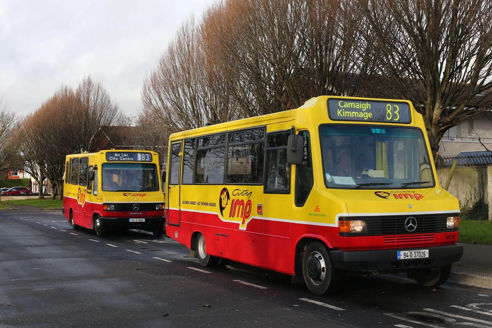 Yellow and red Dublin Bus City Imp minibus